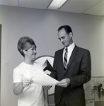 Employees Pose with Document, Delta Air Lines, B by George Skip Gandy IV