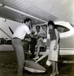 Deboarding a Private Plane, Tampa, Florida, A by George Skip Gandy IV