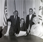 Group Reviweing Documents, C by George Skip Gandy IV