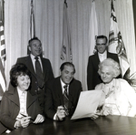 Group Reviweing Documents, G by George Skip Gandy IV