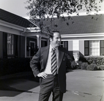 Business Professional in Front of Building, H by George Skip Gandy IV