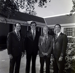 Four Business Men in Front of Building, B by George Skip Gandy IV