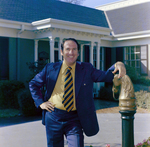 Business Professional in Front of Building, J by George Skip Gandy IV