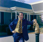 Business Professional in Front of Building, K by George Skip Gandy IV