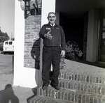 Welcoming Stance Outside a Brick Building, A by George Skip Gandy IV