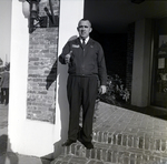 Man in Business Attire Greeting Outdoors, B by George Skip Gandy IV