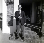 Businessman Standing on Brick Steps, B by George Skip Gandy IV