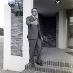 Businessman with Outstretched Hand, B by George Skip Gandy IV