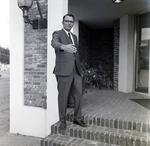 Businessman with Outstretched Hand, C by George Skip Gandy IV