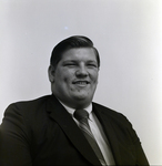 Studio Shot of a Man in a Suit, C by George Skip Gandy IV