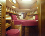 Endeavour Yacht Interior With a Red Seating Area, A by George Skip Gandy IV