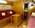 Endeavour Yacht Interior With a Red Seating Area, D by George Skip Gandy IV