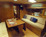 Endeavour Yacht Interior With a Dining Area, K by George Skip Gandy IV