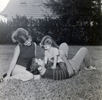 Family Relaxing on a Lawn, E by George Skip Gandy IV