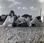 Family Relaxing on a Lawn, T by George Skip Gandy IV