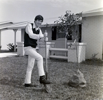 Man Planting a Tree in Front of a House, I by George Skip Gandy IV