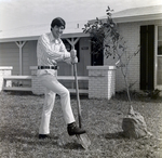 Man Planting a Tree in Front of a House, X by George Skip Gandy IV