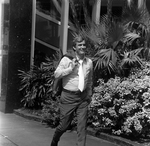 Man Walking on North Ashley Drive in Tampa, Florida, F by George Skip Gandy IV