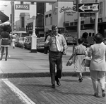 Man Walking Past Twiggs Street, Tampa, Florida, A by George Skip Gandy IV