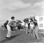 Group Playing Soccer Near Spanish Oaks Apartment Complex, Tampa, Florida, A by George Skip Gandy IV