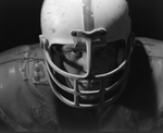 Football Player in Helmet and Shoulder Pads, C by George Skip Gandy IV