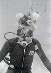 Underwater Diver in White Star Gear, A by George Skip Gandy IV