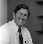 Portrait of Smiling Man in Business Attire, C by George Skip Gandy IV