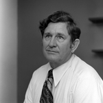 Portrait of Smiling Man in Business Attire, G by George Skip Gandy IV