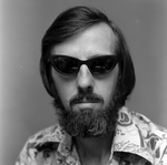 Man Wearing Sunglasses and Printed Shirt, A by George Skip Gandy IV