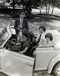 General Telephone and Electronics Corporation Employees in a Volkswagen Beetle Convertible, E by George Skip Gandy IV
