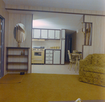 View from Living Room into Kitchen and Dining Area in Guerdon Industries Manufactured Home, C by George Skip Gandy IV