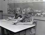 Children Working with Clay in Classroom, Tampa, Florida by George Skip Gandy IV