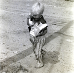 3-Year-Old Eric Gandy Uses Corded Phone, C by George Skip Gandy IV