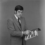 Portrait of a Man in a Suit in a Studio, B by George Skip Gandy IV