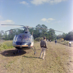 Helicopter in Field for M-C Development by George Skip Gandy IV