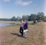 Businesspeople Stand in Field for M-C Development, I by George Skip Gandy IV