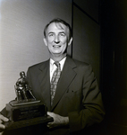 Representative Sam Gibbons Holding United Cerebral Palsy of Tampa Humanitarian Service Award, B by George Skip Gandy IV