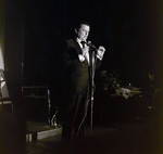 Performer Entertains Crowd During Award Dinner for Representative Sam Gibbons, A by George Skip Gandy IV