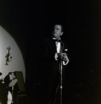 Performer Entertains Crowd During Award Dinner for Representative Sam Gibbons, B by George Skip Gandy IV