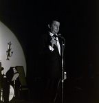 Performer Entertains Crowd During Award Dinner for Representative Sam Gibbons, C by George Skip Gandy IV