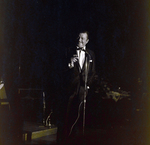 Performer Entertains Crowd During Award Dinner for Representative Sam Gibbons, G by George Skip Gandy IV