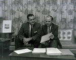 Two Men Sit in March of Dimes Office at 308 Tampa Street by George Skip Gandy IV