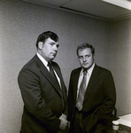 Two Men Posing for Marine Bank, A by George Skip Gandy IV