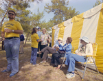 People Sitting by Tent at Marion Oaks Country Club by George Skip Gandy IV