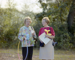 Women Holding Balloon Animals at Marion Oaks Country Club by George Skip Gandy IV
