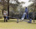 Children Playing on Seesaw and Slide at Marion Oaks Country Club by George Skip Gandy IV