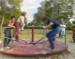 Children Playing on Playground Equipment at Marion Oaks Country Club, C by George Skip Gandy IV