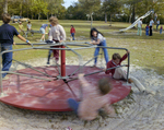 Children Playing on Playground Equipment at Marion Oaks Country Club, E by George Skip Gandy IV