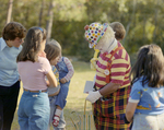 Clown Standing with Children at Marion Oaks Country Club, A by George Skip Gandy IV