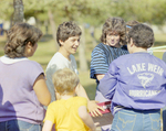 People Standing Together at Marion Oaks Country Club by George Skip Gandy IV